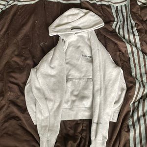 Essentials Fear of God hoodie oatmeal color way